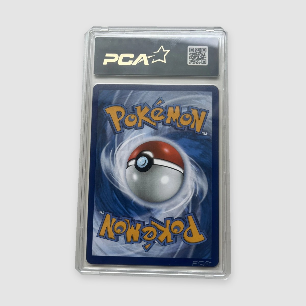 Magicarpe Brillant 66/64 Célébrations PCA 9,5 FR, vue du verso sur fond gris