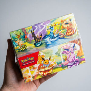 Display Mini Tins Évolutions Prismatiques EV8.5 – Neuf scellé FR