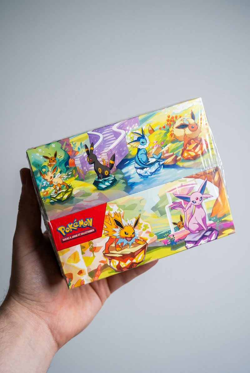 Display Mini Tins Évolutions Prismatiques EV8.5 – Neuf scellé FR
