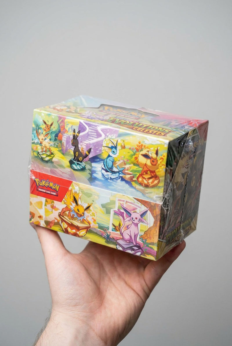 Display Mini Tins Évolutions Prismatiques EV8.5 – Neuf scellé FR